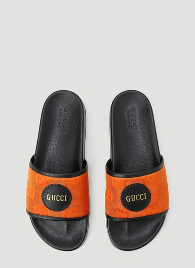 Shop Gucci Off The Grid Slides In Orange