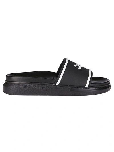 Shop Alexander Mcqueen Embossed Logo Slides In Black