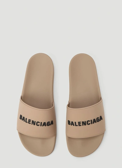 Shop Balenciaga Logo Printed Pool Slides In Beige