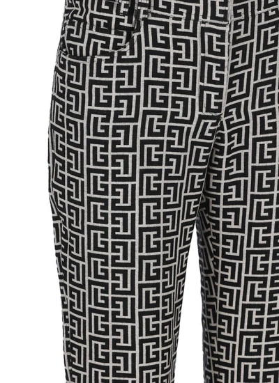 Shop Balmain Trousers In Ivoire / Noir