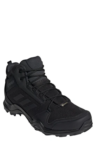 Shop Adidas Originals Ax3 Mid Gore-tex® Waterproof Hiking Shoe In Black/ Black/ Carbon