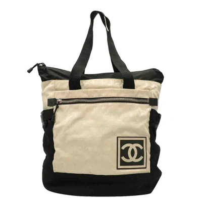 Pre-owned Chanel Black/ivory Canvas Travel Line Backpack In Multicolor