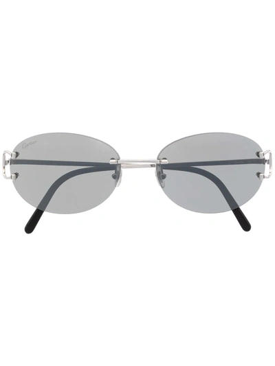 Shop Cartier Logo-engraved Oval Sunglasses In Silber