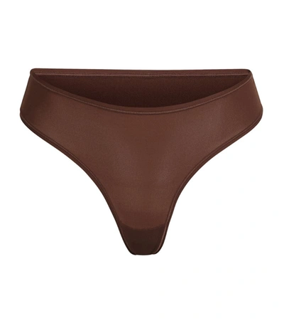 Shop Skims Fits Everybody Cheeky Thong In Brown