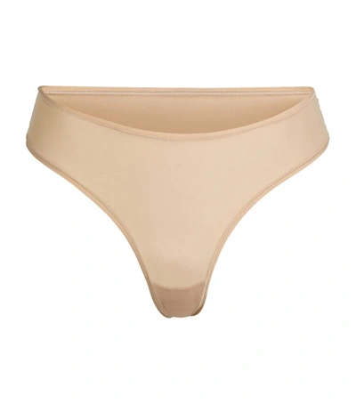 Shop Skims Fits Everybody Cheeky Thong In Beige