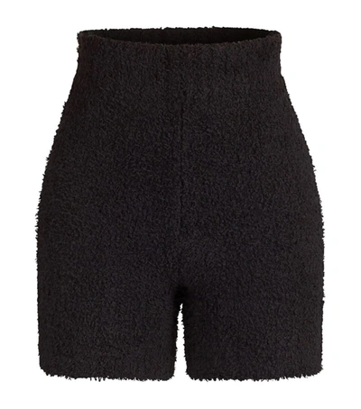 Shop Skims Cozy Knit Shorts In Black