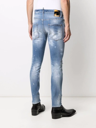 Shop Dsquared2 Paint-splatter Ripped Skinny Jeans In Blue