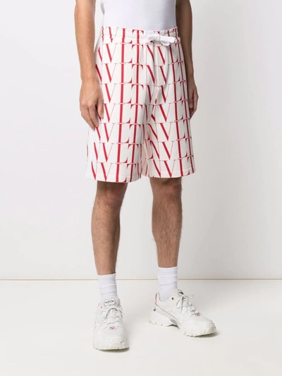 Shop Valentino Vltn-print Shorts In White