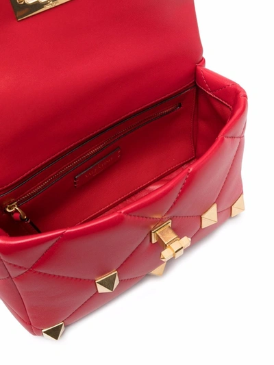 Shop Valentino Medium Roman Stud Shoulder Bag In Red