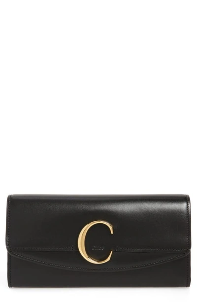 Shop Chloé Long Calfskin Leather Flap Wallet In Black