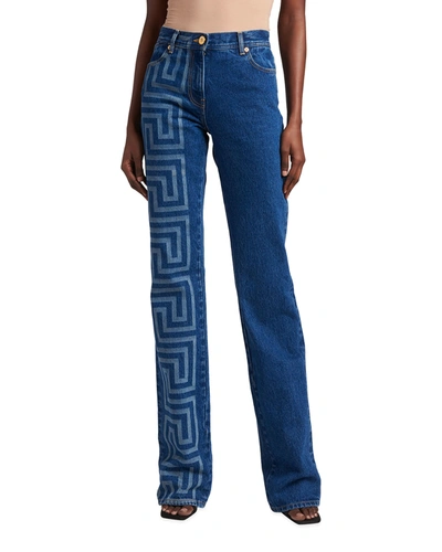 Shop Versace Greca Print Flare-leg Jeans In Dark Blue