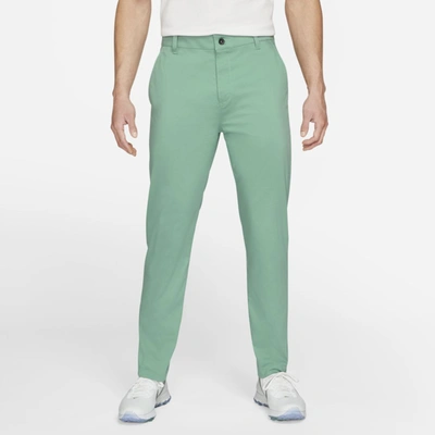 Shop Nike Dri-fit Uv Men's Slim-fit Golf Chino Pants In Healing Jade