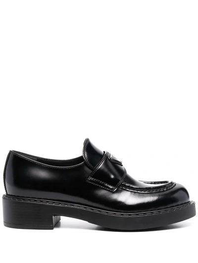 Shop Prada Triangle Logo Plaque Loafers In Schwarz