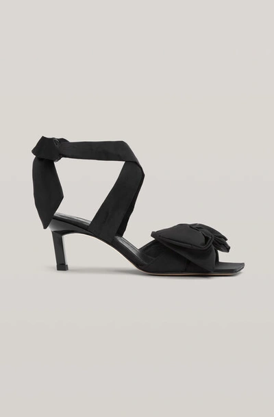 Shop Ganni Recycled Nylon Heeled Bow Sandal In Black