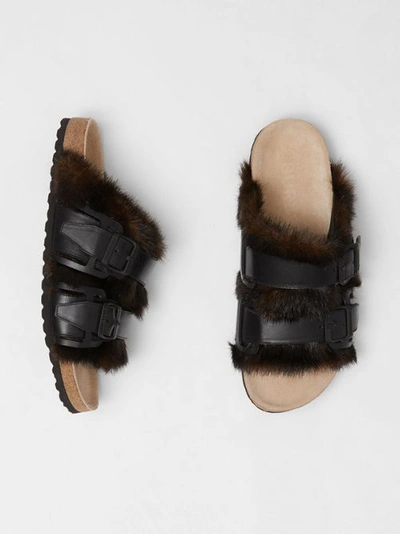 Shop Burberry Leather And Faux Fur Sandals In Black