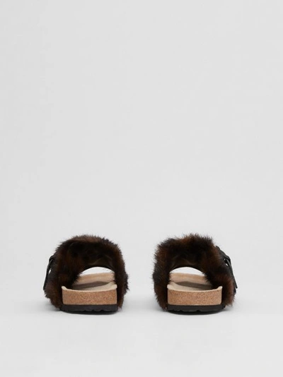 Shop Burberry Leather And Faux Fur Sandals In Black
