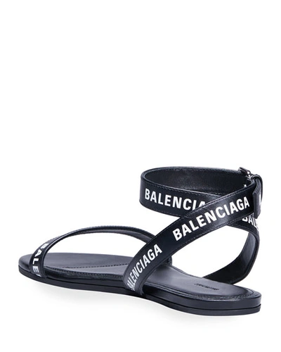 Shop Balenciaga Logo Ankle-strap Flat Sandals In Black