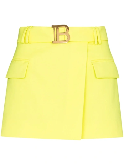 Shop Balmain B Buckle Mini Skirt In Gelb