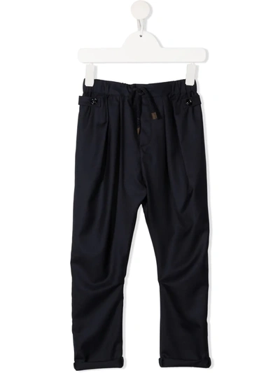 Shop Brunello Cucinelli Tapered Virgin Wool-blend Trousers In Blue