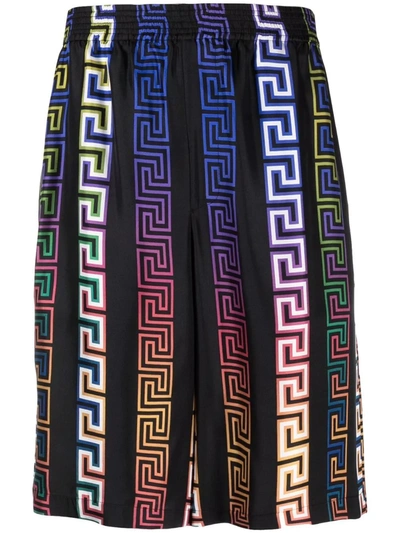 Shop Versace Greca Neon-print Silk Shorts In Schwarz