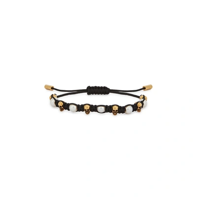 Shop Alexander Mcqueen Skull-embellished Cord Bracelet In Black