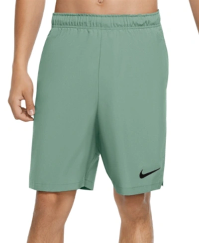 Shop Nike Men's Flex Woven Training Shorts In Steam Green/black