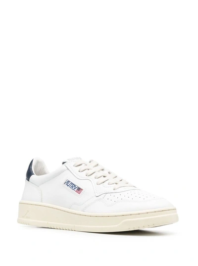 Shop Autry 01 Leather Sneakers With Blue Heel Tab In White