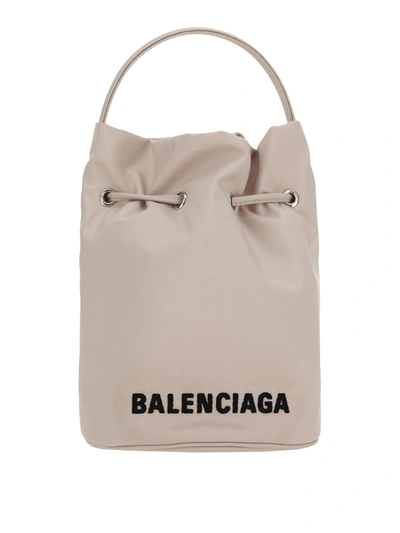 Shop Balenciaga Wheel Mini Bucket Bag In Cream