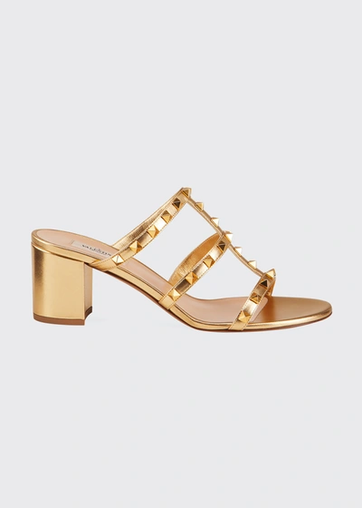 Shop Valentino City Rockstud Metallic Slide Sandals In Gold