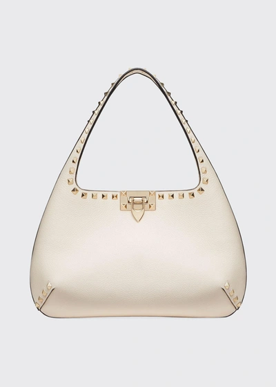 Shop Valentino Rockstud Small Leather Hobo Bag In Taupe