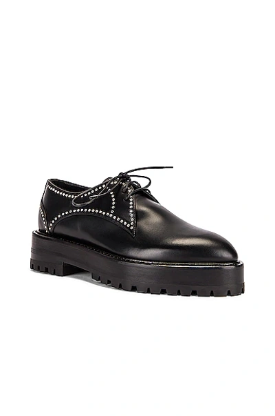 Shop Alaïa Eyelet Derby Loafers In Noir