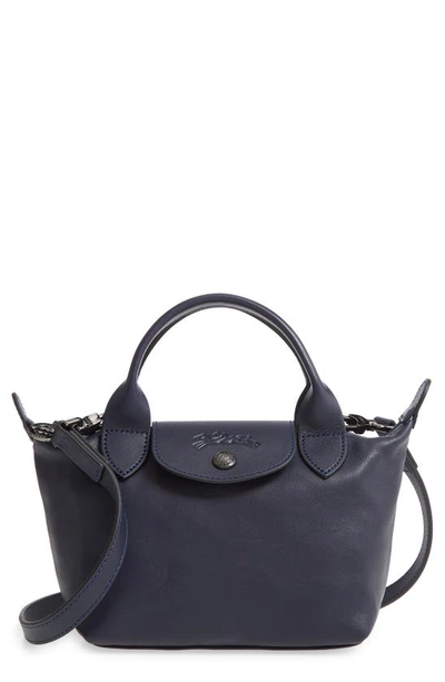 Shop Longchamp Mini Le Pliage Cuir Leather Top Handle Bag In Sky Blue