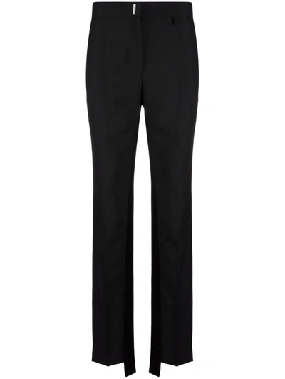 Shop Givenchy Distressed-cuff Trousers In Schwarz