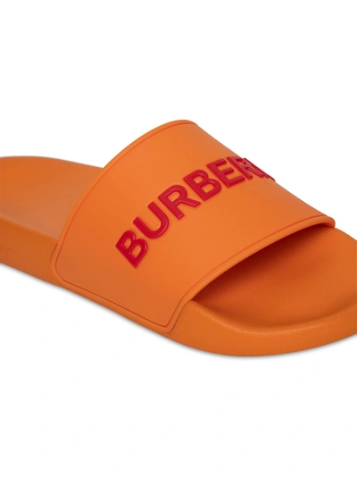 Shop Burberry Deep Orange Logo Slides