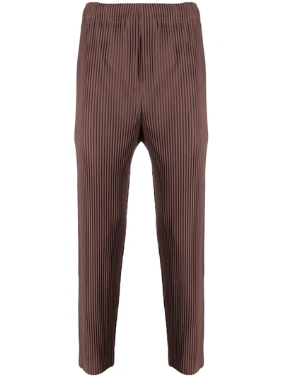 Shop Issey Miyake Technical-pleat Cropped Trousers In Brown