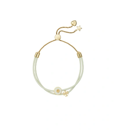 Shop Tory Burch Kira Enamel Slider Bracelet In Tory Gold / New Ivory