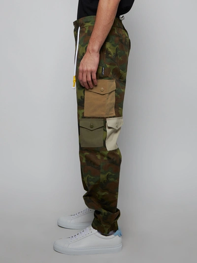 Shop Palm Angels Camouflage Cargo Pants, Green