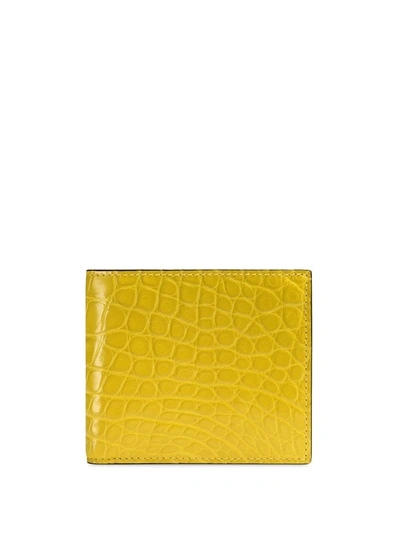 Shop Gucci Embossed Bi-fold Wallet In Yellow