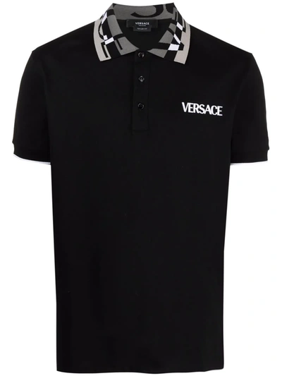 Shop Versace Logo-embroidered Polo Shirt In Schwarz