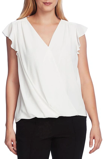 Shop Vince Camuto Flutter Sleeve Wrap Front Blouse In New Ivory