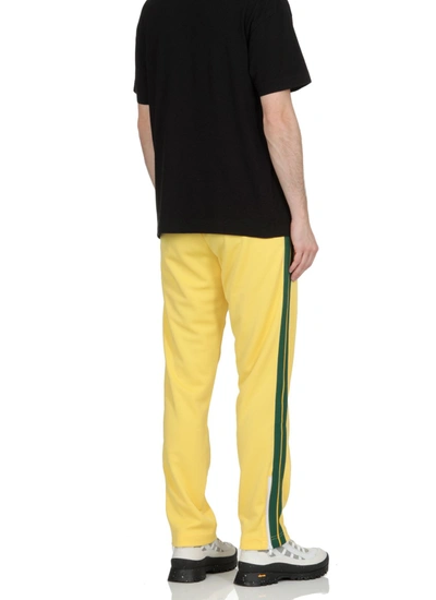 Shop Palm Angels Trousers Yellow