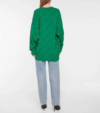 Shop Balenciaga Logo Cotton Sweater In 绿色