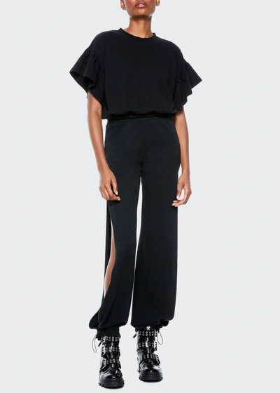 Shop Alice And Olivia Miami Side-slit Joggers In Black