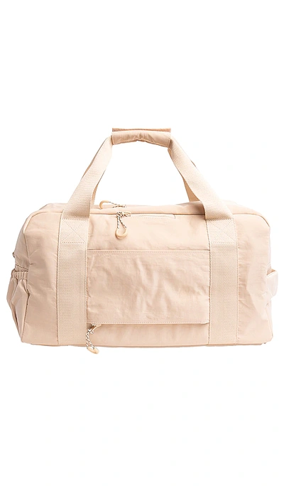 Shop Beis The Sport Duffle In Beige