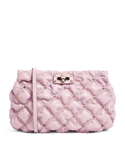 Shop Valentino Garavani Spikeme Clutch Bag In Pink