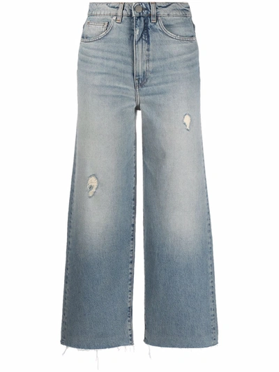 Shop Totême Cropped Distressed-effect Jeans In Blue