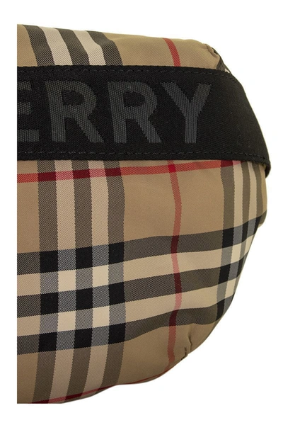 Shop Burberry Sonny - Medium Vintage Check Econyl® Bum Bag In Archive Beige