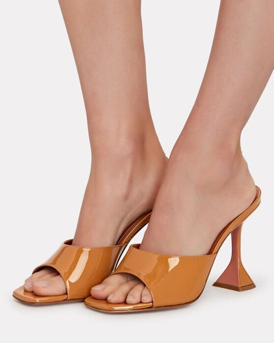 Shop Amina Muaddi Lupita Patent Leather Sandals In Brown