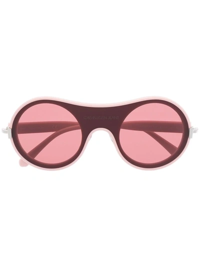 Shop Calvin Klein Jeans Est.1978 Round-frame Sunglasses In Rosa