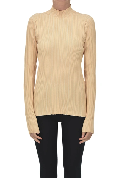 Shop Acne Studios Ribbed Knit Turtleneck Pullover In Beige